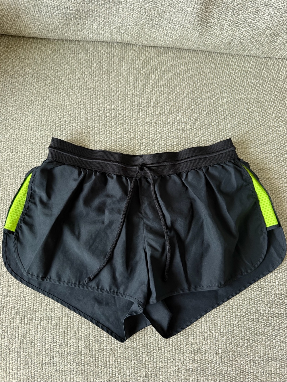 Nike Black Athletic Shorts with Neon Green Side Panels